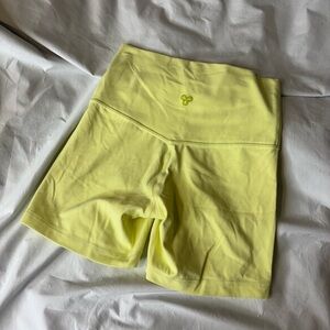 Aritiza TNA Yellow TNAction Shorts